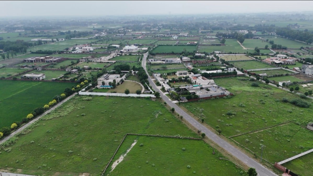 Aerial view of the community and neighbouring farmhouses